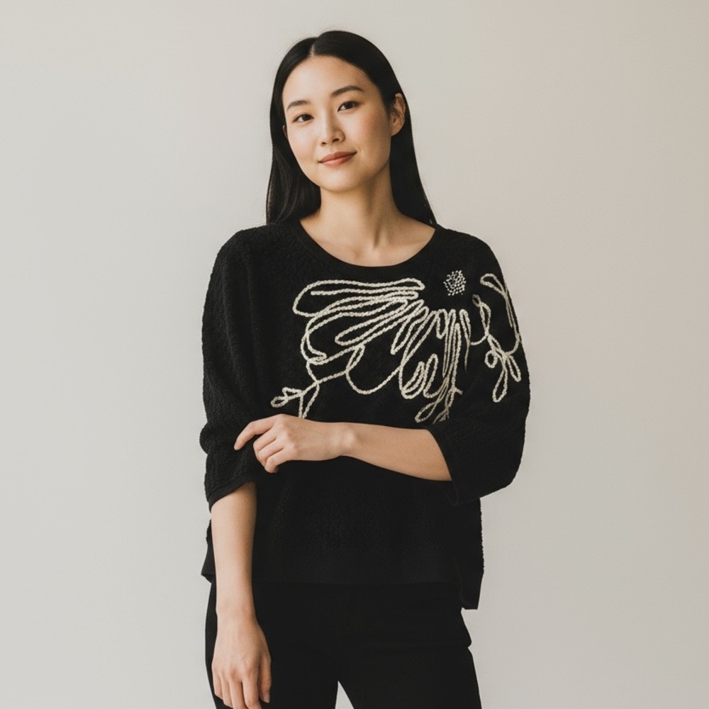 Elegant Black Sweater with Embroidered Design